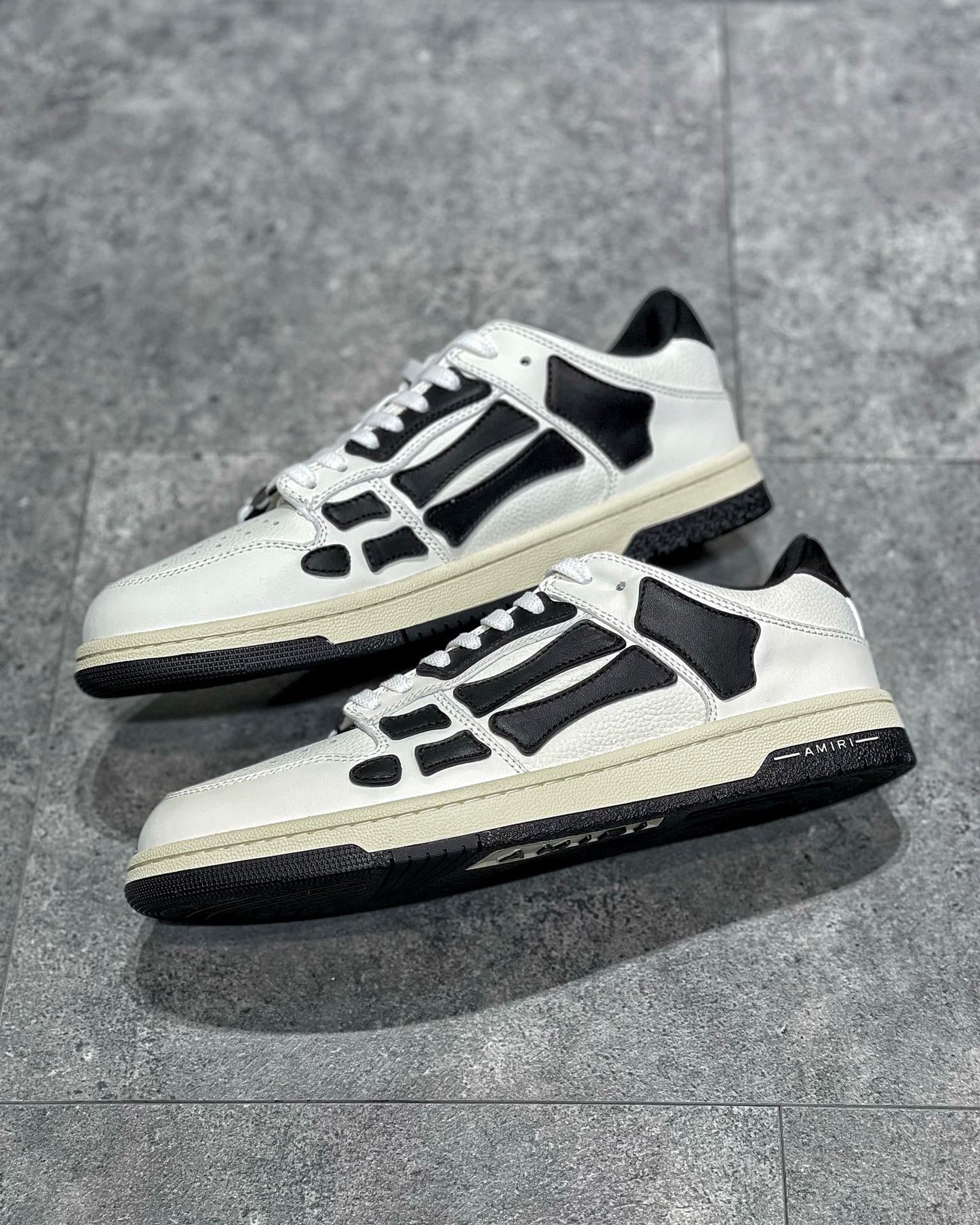 Am*ri Skel Top Low Black white